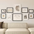 Stylish Photo Wall With Black White Decorative Frames In Neutral Living Room