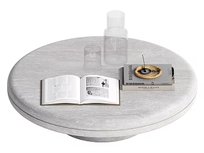 Light Colored Round Table With Open Book And Golden Cover Book Transparent Bottle Small Cup 3d model