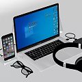 Modern Laptop Setup With Smartphone Headphones External Hard Drive And Charging Cable