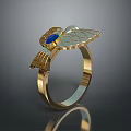 Elegant Gold Ring With Intricate Wing Design And Blue Gemstone Accent 3d model