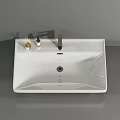 Modern White Ceramic Washbasin Design With Chrome Faucet And Decorative Items