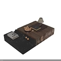 Modern Coffee Table With Black Marble And Wooden Top And Books Bowl Lamp On Surface