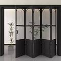 Modern Black Folding Door with Glass Panels in Interior Space and Green Plants