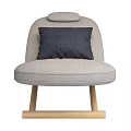 Comfortable Gray Linen Lounge Chair With Navy Pillow And Wooden Legs