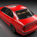 Red BMW Classic Sedan With Beige Interior Black Wheels And Sleek Design