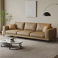 Modern Beige Three Seater Leather Sofa with Round Coffee Table Plants Artwork and Pendant Light