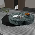 Round Green Marble Coffee Table With Oranges Book And Plant On Modern Rug