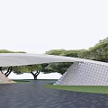 Modern Curved Entrance Gate With Textured Surface Surrounded by Green Trees