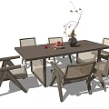 Modern Wooden Dining Table Set With Woven Chairs And Decorative Vase Fruit