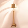 Warm Illuminated Golden Table Lamp With Classic Lampshade And Metal Base