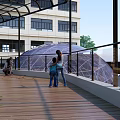 Modern Building Exterior Featuring Glass Dome Structure With Landscaped Trees And Lawn