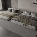 Modern Bedroom Interior With Double Beds Yellow Brown Quilts And Gray Pillows