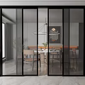 Modern Glass Sliding Doors With Black Frames In Dining Room With Table And Chairs