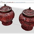 Pair of Red Traditional Ceramic Vessels with Intricately Carved Patterns and Ornate Lids