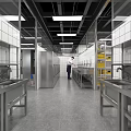 Commercial Catering Kitchen Interior With Chefs Working At Stainless Steel Worktables And Commercial Appliances