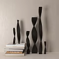 Modern Decorative Ornament Set With Twisted Black Sculptures And Stacked Books