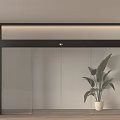 Modern Black Frame Glass Partition With Green Plant Light Colored Wall And Wooden Floor