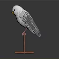 White and Gray Parrot with Yellow Beak Perched on Red Wooden Stand