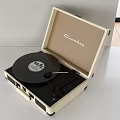 Crosley Open Case Turntable With Vinyl Record In Cream Black Design On White Table
