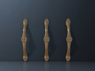 Three Golden Decorative Brass Door Handles On Dark Wall With Ornate Design 3d model