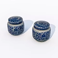 Two blue and white ceramic jars with floral pattern and lids 3d model