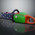 Colorful Chainsaw With Blue Green Orange Body Yellow Polka Dots And Black Handle Chain