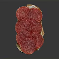 Fresh Toasted Bread Topped with Savory Salami Slices and Butter