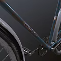 Teal Vintage Bicycle With Gray Seat And Spoked Wheels In Retro Style