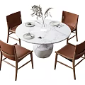 Round Marble Dining Table With Four Brown Chairs And Wooden Legs