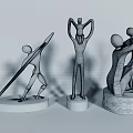 Golden Modern Metal Sculptures Featuring Abstract Human Throwing Holding And Embracing Figures