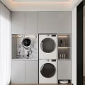 Modern Laundry Room Design With Built In Washing Machines White Cabinets And Marble Countertop