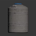 Silver Metallic Barrel With Blue Lid And A3OT Marking On Dark Surface