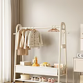 White Floor Standing Clothes Hanger With Hanging Light Clothes And Stuffed Giraffe