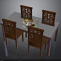 Wooden Dining Table With Four Carved Decorative Chairs And White Tabletop With Food Plates