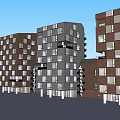 Modern Multi Story Residential Buildings With Varied Colored Facades Windows And Blue Sky