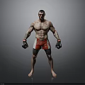 Muscular Shirtless Man With Tattoos In Black Boxing Gloves Red White Shorts Against Gray Background
