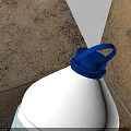 Household Items In Open Cardboard Box With White Bottle Blue Cap And Orange Can