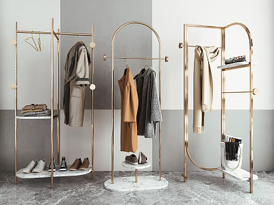 Stylish Gold Metal Arc Clothing Display Racks With Hanging Coats Shoes And Marble Bases 3d model