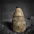 Ceramic Sculpture With Intricate Carvings In Conical Shape On Stone Base