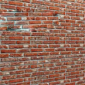Classic Red Brick Wall with Natural Texture and Rustic Pattern Design