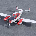 Red and White Twin Engine Passenger Plane Parked on Gray Tarmac