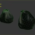 Two Black Tied Plastic Trash Bags For Household Waste Disposal