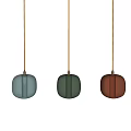 Colored Glass Pendant Lights With Spherical Textured Design And Illuminated Metal Fixtures