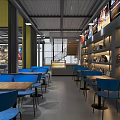 Modern Sports Store Interior With Wooden Walls Round Display Tables Soccer Balls And Folded Clothes
