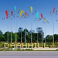 Colorful Human Figure Sculptures on Tall Poles with Background Trees in DASHANHILL International Park