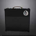 Portable Black Electronic Speaker With Brown Handle Mesh Design And Sticker