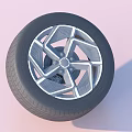 Four Modern Car Tires With Stylish Alloy Wheels And Silver Rims
