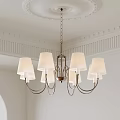 Elegant Classic Chandelier With White Lampshades And Metal Frame On Decorative Ceiling