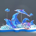 Vibrant Blue Dolphin And Fish 3D Sculptures With White Decorations On Wavy Blue Base