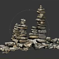 Artistic Stacked Stone Sculpture With Tower Like Structures And Irregular Base Stones